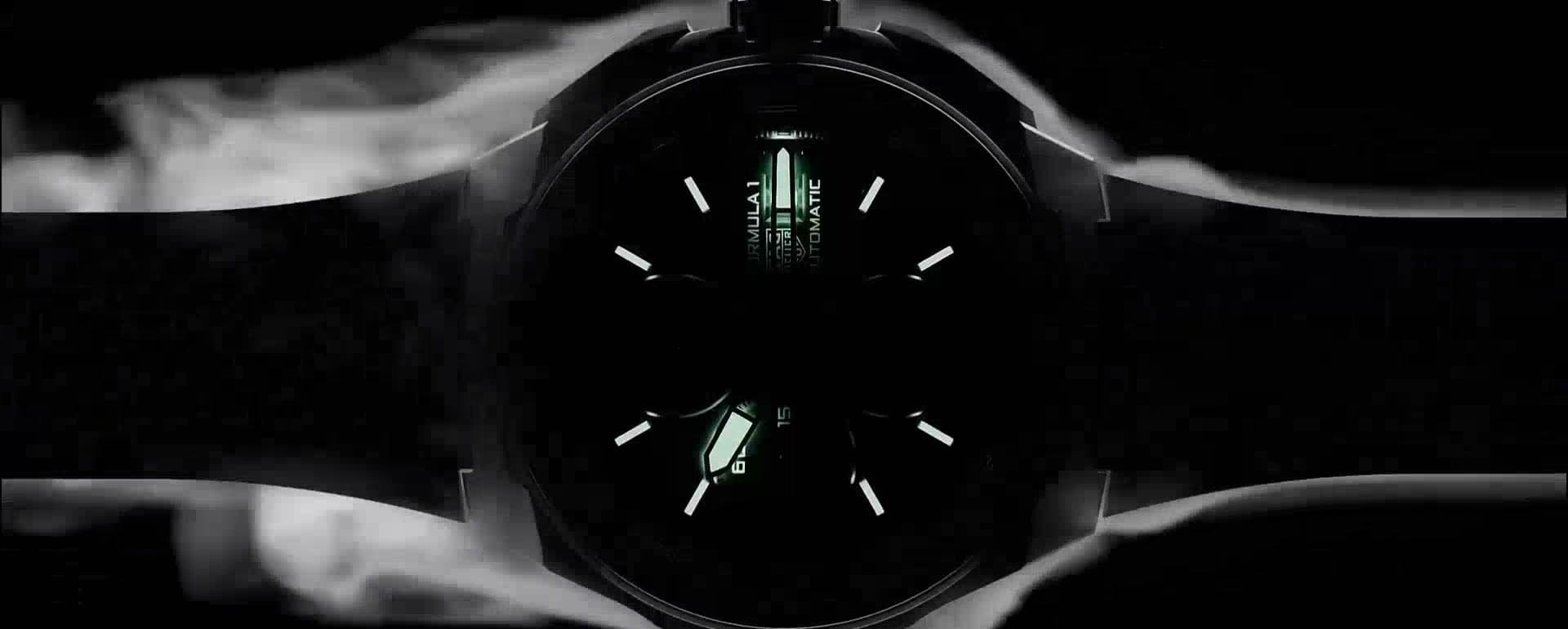 TAG Heuer film still, a Formula 1 dial lit by green lume